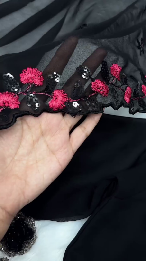 Black Anarkali Gown with Sheer Full Sleeves, Square Neckline, Matching Embroidered Dupatta with Pink Floral Sequin Detailing, Coordinated Accessories Including Hair Ties, Earrings, and Clutch – Perfect for Festive and Evening Wear - Image 2