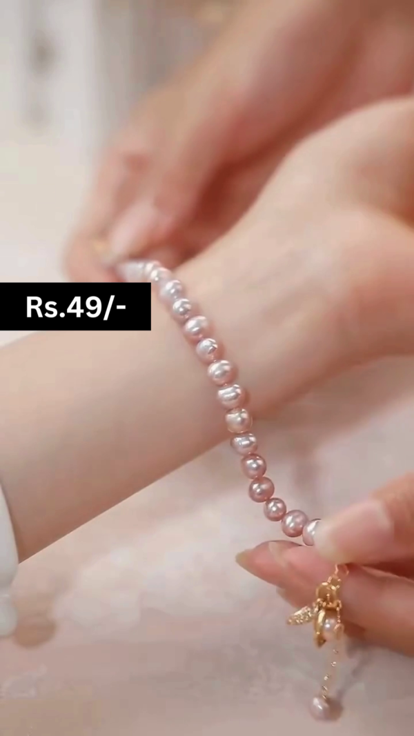 Charming Pink Beaded Pearl Bracelet with Gold Heart Pendant and Central Pearl Accent – Elegant and Trendy Wrist Accessory for Women and Girls - Image 2