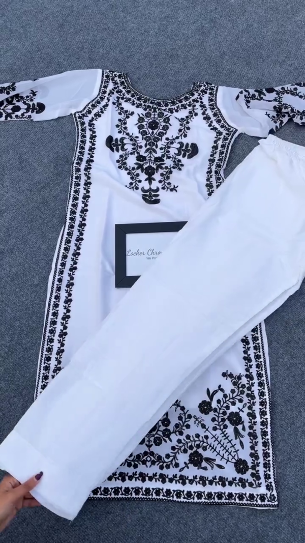 White and Black Chikankari Embroidered Cotton Straight Kurta with Matching Bottoms, Full Sleeve Ethnic Suit Set for Women – Graceful Floral Thread Work and Traditional Design