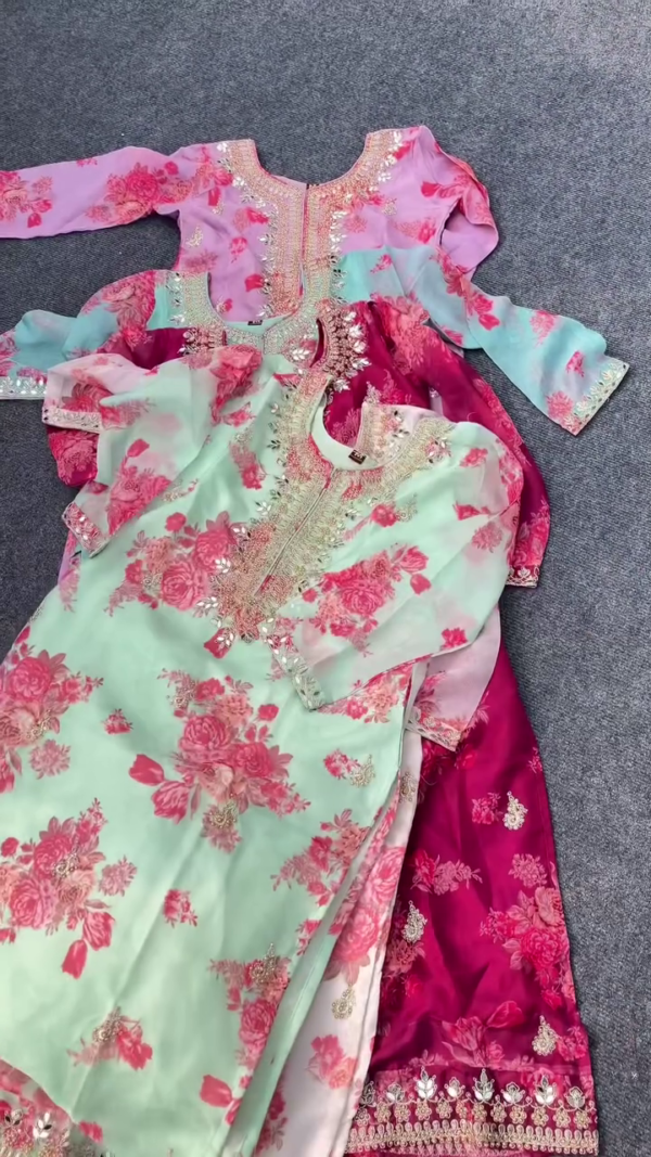 Designer Floral Printed Organza Suit Set for Women with Intricate Mirror Work Neckline, Embroidered Detailing and Matching Bottoms in Elegant Pastel and Bold Shades – Perfect for Festive and Ethnic Occasions