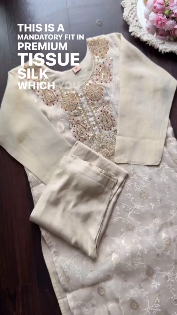 Cream Premium Tissue Silk Straight Kurta Set Featuring Intricate Zari and Sequin Embroidery on Yoke, Subtle Self-Weave Detailing, Paired with Coordinated Bottoms and Contrasting Rich Pink Banarasi Floral Dupatta – Ideal for Festive and Ethnic Celebrations - Image 2