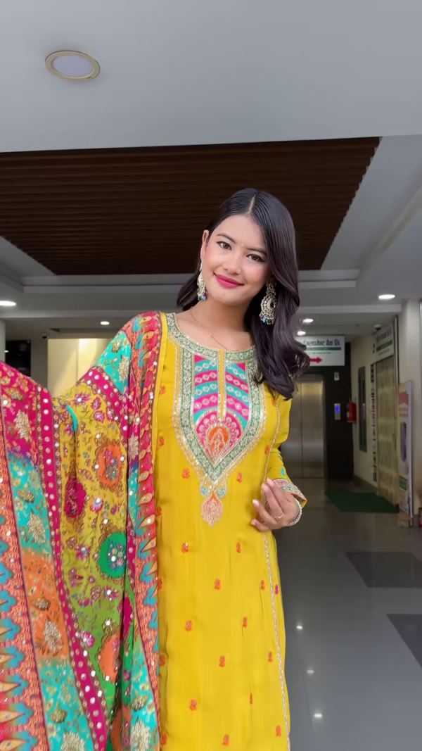Vibrant Yellow Ethnic Sharara Suit with Multi-Color Heavy Embroidered Dupatta, Ornate Neckline Design, Mirror Accents, and Coordinated Sharara Bottom – Ideal for Festive Occasions, Haldi Ceremonies, and Traditional Gatherings - Image 3