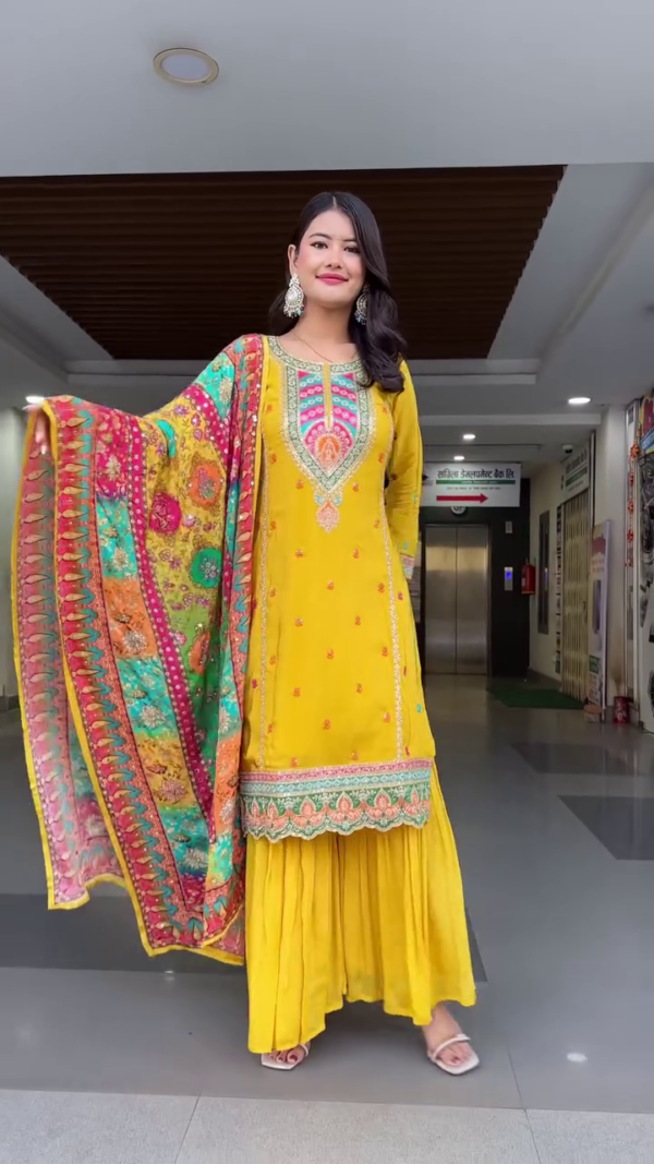 Vibrant Yellow Ethnic Sharara Suit with Multi-Color Heavy Embroidered Dupatta, Ornate Neckline Design, Mirror Accents, and Coordinated Sharara Bottom – Ideal for Festive Occasions, Haldi Ceremonies, and Traditional Gatherings - Image 2