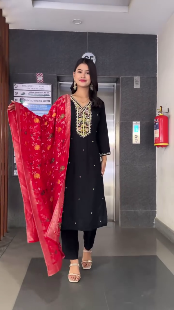 Black Straight-Cut Kurta Set with Intricate Multicolor Thread Embroidery and Mirror Work on Neckline, Paired with Matching Bottoms and a Rich Red Velvet Floral Printed Dupatta – Perfect for Festive Celebrations and Evening Occasions - Image 3