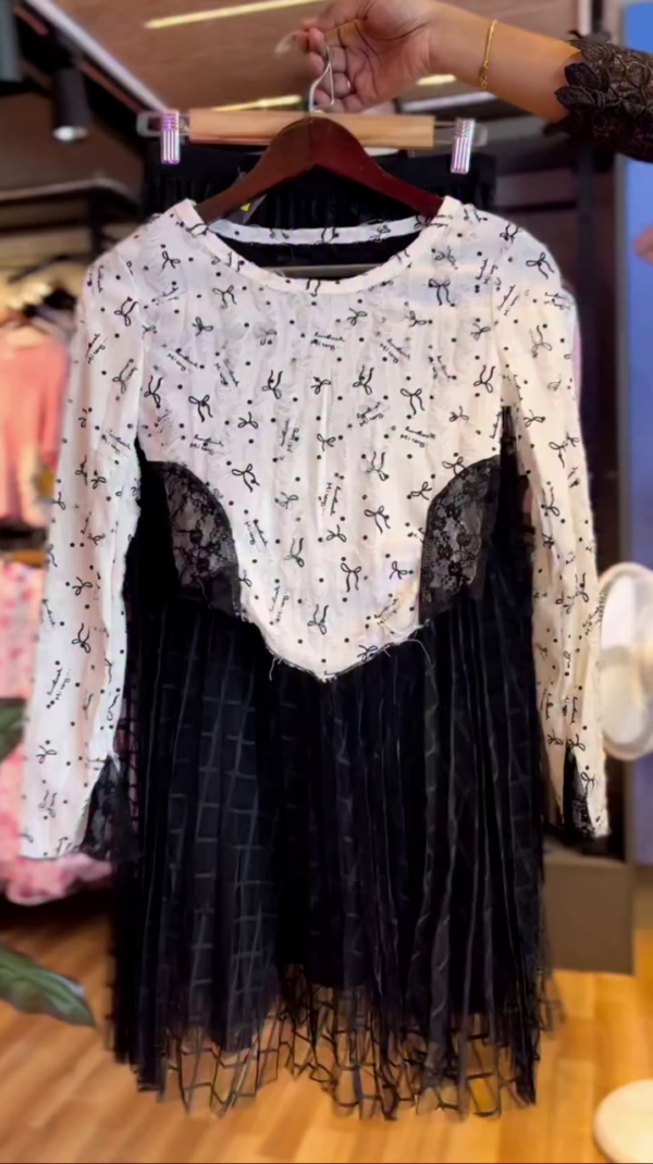 Chic Black and White Designer Fusion Dress with Printed Bow Pattern, Lace Insets, Geometric Pleated Net Skirt, and Full Sleeves – A Unique Indo-Western Look for Parties or Evening Wear