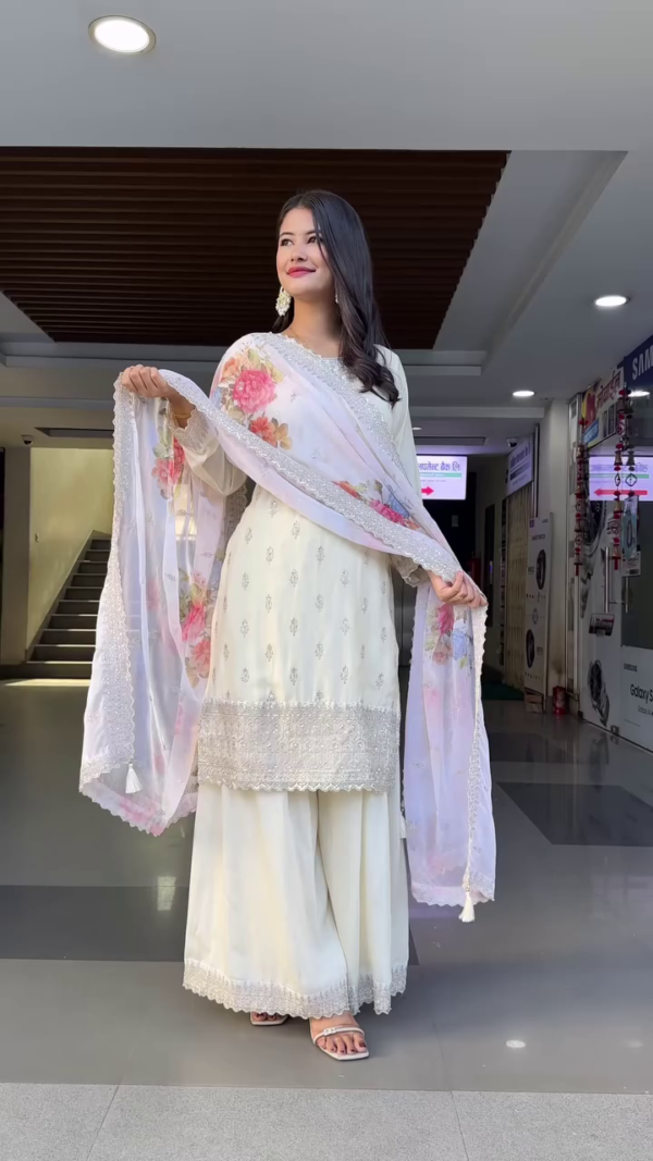 Off-White Designer Palazzo Suit Set with Intricate Silver Embroidery, Floral Printed Organza Dupatta, and Detailed Lace Borders – Perfect for Festive Occasions and Traditional Celebrations