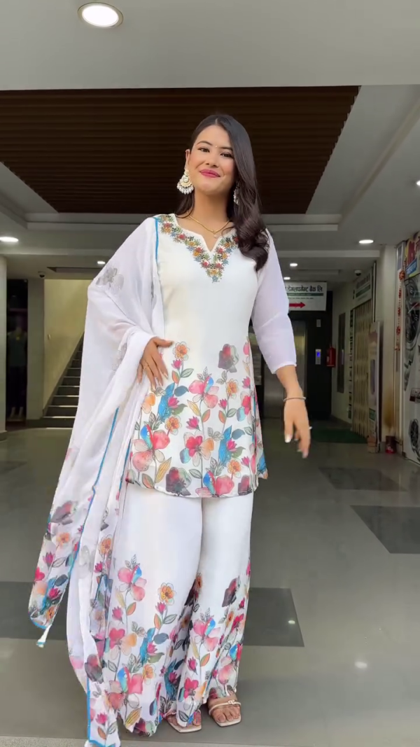 White Floral Printed Kurta Set with Flared Palazzo Pants and Matching Dupatta – Featuring a Delicate Multicolor Watercolor Floral Design, Sheer Sleeves, and Embroidered Neckline for a Graceful Traditional Look