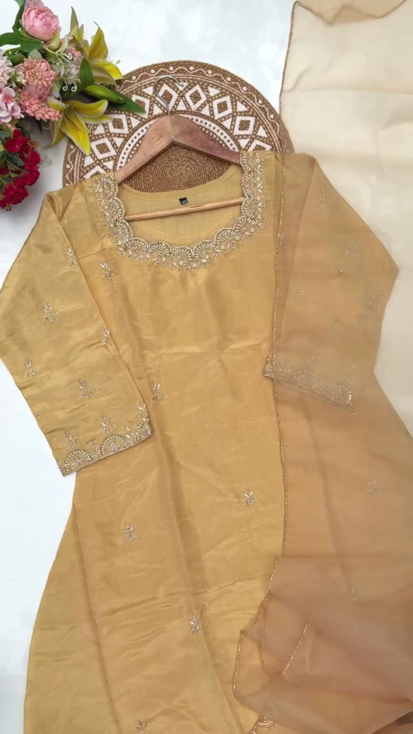 Mustard Yellow Embroidered Organza Suit Set Featuring Delicate Thread Work on Neckline, Sleeves, and Dupatta – Comes with Matching Elastic Waist Bottoms and Sheer Dupatta for a Graceful Ethnic Look