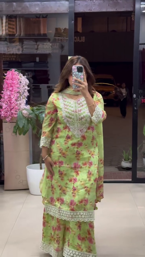 Floral Printed Straight Suit Set in Vibrant Green and Pink Shades, Featuring Intricate Lace Detailing on Neckline, Sleeves, and Hem – Paired with Matching Palazzo Pants and Coordinated Dupatta for a Refreshing Festive and Summer Look - Image 2