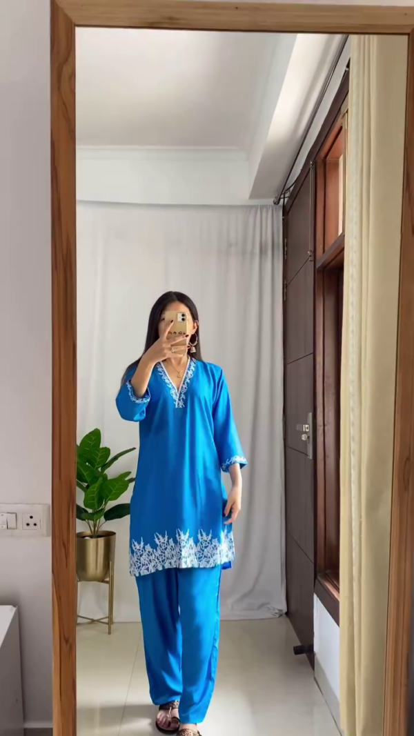 Summer Cotton Kurta Sets for Women Featuring Blue Embroidered Neckline Kurta with Solid Pants, Light Blue Paisley Printed Kurta with Zigzag Pattern Pants, and White Floral Printed Kurta with Coordinated Wide-Leg Bottoms – Perfect for Casual Ethnic Wear and Everyday Comfort