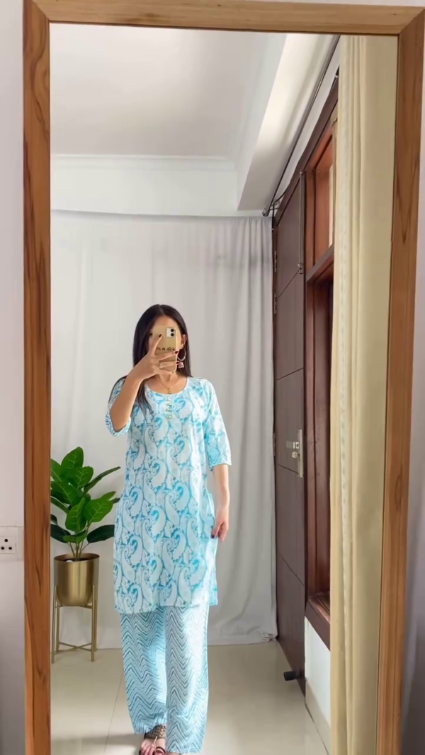 Summer Cotton Kurta Sets for Women Featuring Blue Embroidered Neckline Kurta with Solid Pants, Light Blue Paisley Printed Kurta with Zigzag Pattern Pants, and White Floral Printed Kurta with Coordinated Wide-Leg Bottoms – Perfect for Casual Ethnic Wear and Everyday Comfort - Image 4