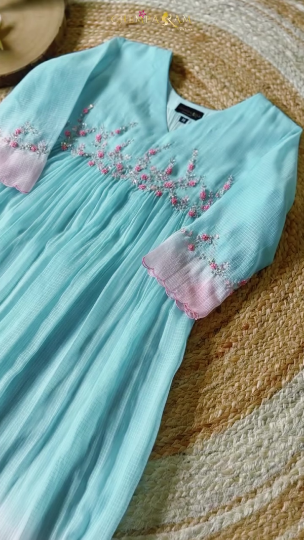 Pastel Blue Pleated Girls Dress with Delicate Pink Floral Embroidery and Ombre Sleeves – Soft Cotton Blend Festive and Casual Wear by Chempakam