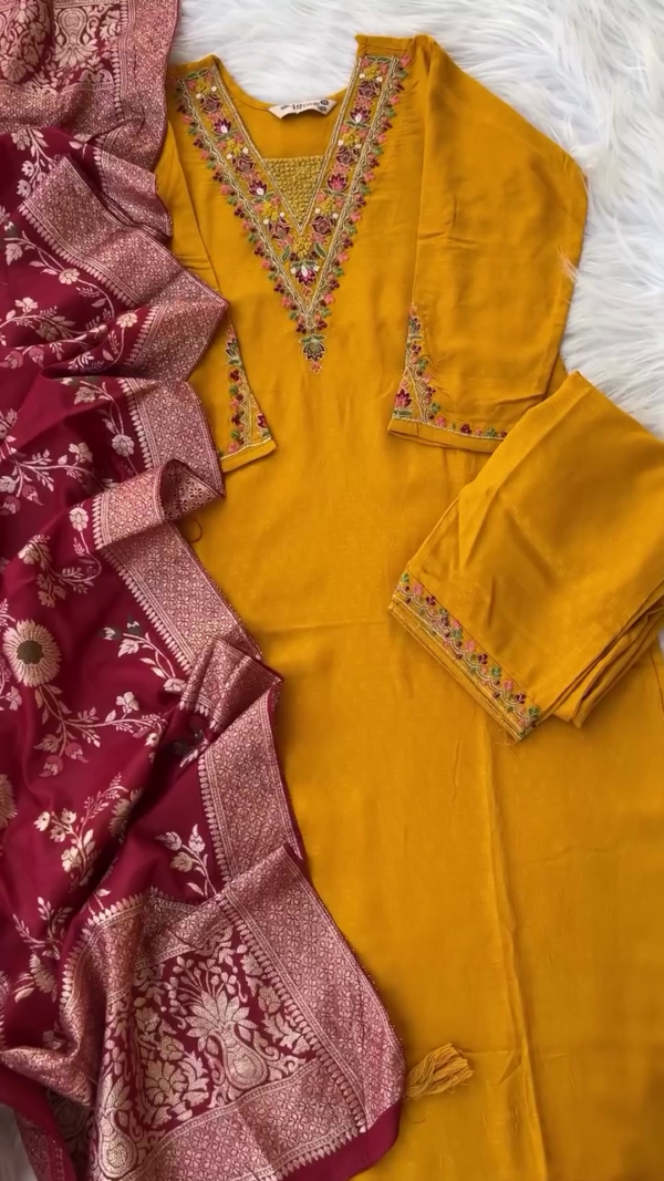 mustard yellow embroidered straight cut suit with intricate floral thread work on neckline and sleeves paired with matching bottoms and rich maroon Banarasi silk dupatta featuring traditional zari motifs and detailed border work - Image 2