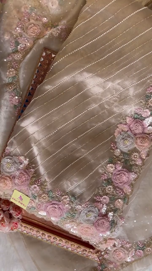 Designer Beige Net Saree with Pearl Striped Pattern and Intricate 3D Floral Embroidery Work, Paired with Elegant Blouse and Decorative Packaging Box for Wedding or Festive Wear - Image 3