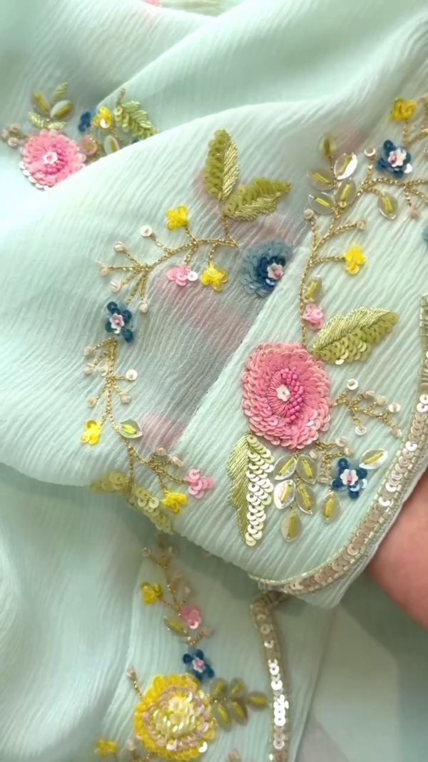 Pastel Green Soft Organza Saree with Multicolor Floral Sequin Embroidery Paired with Vibrant Yellow Thread Work Blouse for Elegant Festive and Daytime Celebrations - Image 3