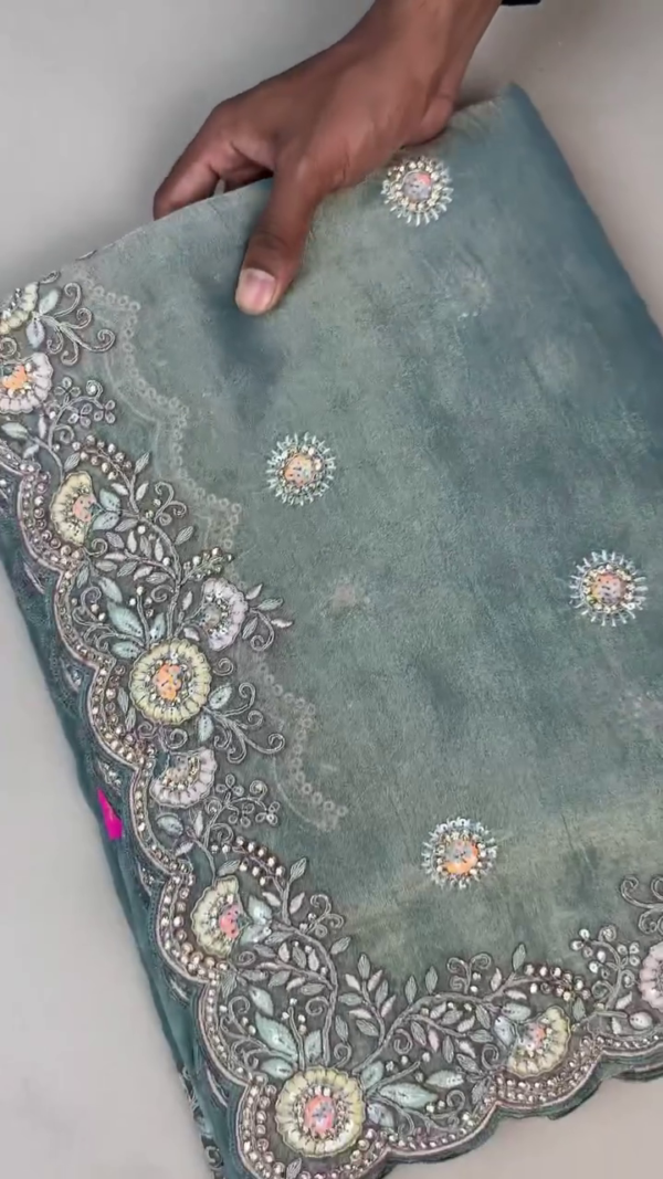 Designer Teal Silk Saree with Intricate Zari Embroidery and Multicolor Floral Sequins on Scalloped Border, Paired with Matching Sequin-Embroidered Blouse – Ideal for Wedding, Festive, and Party Wear