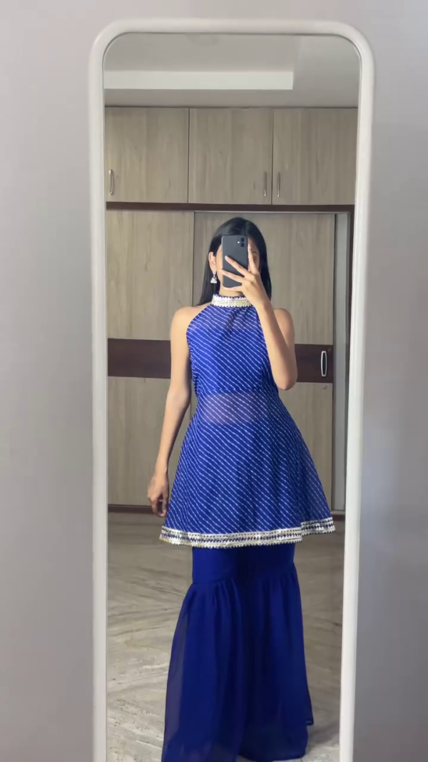 Women's Festive Sharara Set – Designer Sleeveless and Strappy Peplum Kurti with Flared Tiered Sharara Pants and Dupatta – Available in Royal Blue, Elegant White, and Glamorous Maroon – Ethnic Partywear Ensemble