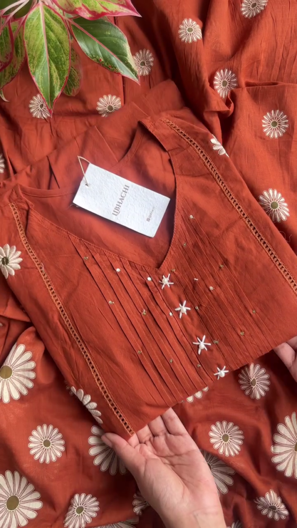 Cotton A-Line Kurti Set with Floral Embroidery, Pintuck Detailing, 3/4 Sleeves and Matching Printed Dupatta – Available in Green and Rust Red Colors