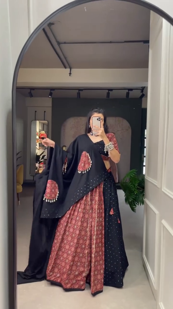 Maroon and Black Traditional Bandhani Print Lehenga Choli Set Featuring Contrasting Mirror Work Dupatta with Tassel Accents – Perfect for Navratri, Weddings, and Festive Celebrations