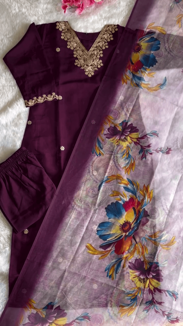 Graceful Wine Purple Straight-Cut Suit Set with Intricate Golden Embroidery on Neckline and Sleeves, Paired with Matching Bottom and Colorful Floral Printed Organza Dupatta – Elegant Ethnic Wear for Women - Image 2