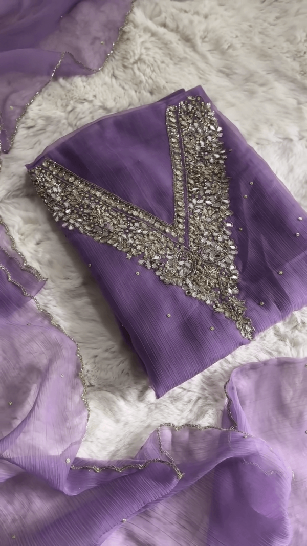 Stunning Lavender Georgette Suit Set Featuring Heavy Mirror and Stone Work on V-Neckline, Delicately Scattered Embellishments, and Matching Dupatta with Shimmering Border – Glamorous Party Wear for Women