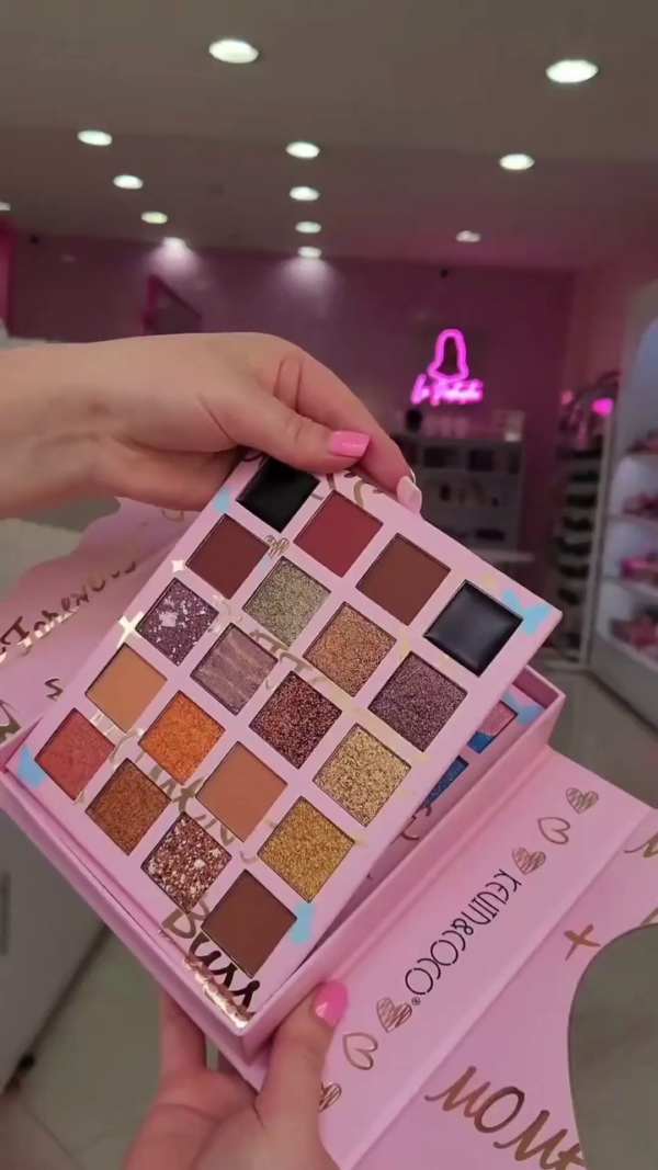 A colorful makeup set with a bright eyeshadow palette and pink lipsticks. - Image 2