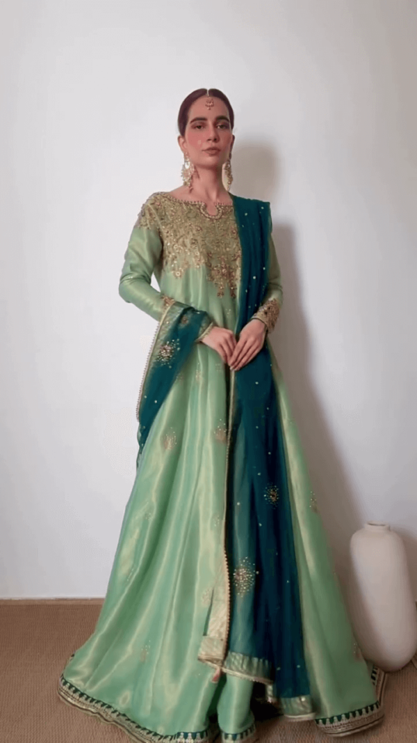 Elegant Mint Green Anarkali Suit with Intricate Golden Embroidery and Contrasting Teal Blue Dupatta – Regal Ethnic Ensemble for Weddings and Festive Occasions