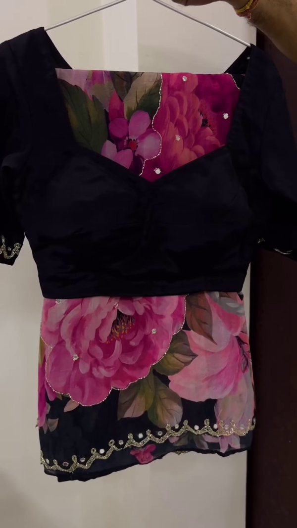 Floral Organza Peplum Blouse with Black Sweetheart Neck Bodice and Sequin Embellishments – A Chic Fusion for Contemporary Ethnic Looks.