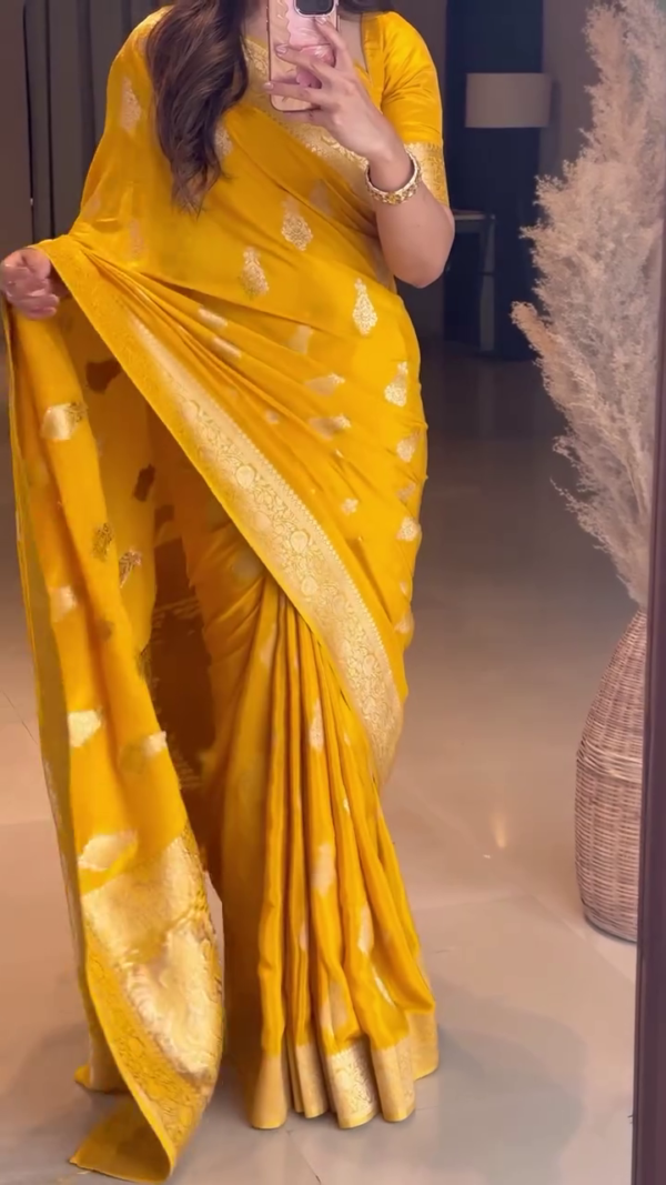 Radiant Mustard Yellow Banarasi Saree with Rich Golden Zari Motifs and Traditional Border – A Regal and Festive Choice for Weddings, Celebrations, and Special Occasions.