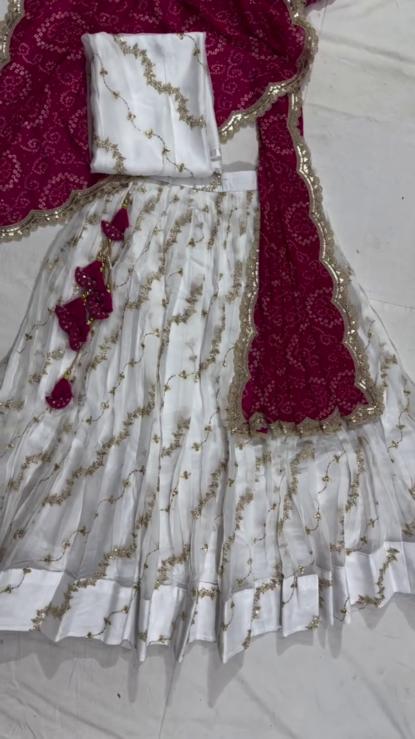 Graceful White and Wine Embroidered Lehenga Set Featuring Sheer Organza Layers with Golden Sequin Work, Contrast Bandhani-Style Dupatta with Gota Border, and Coordinated Blouse – A Striking Festive Ensemble Perfect for Weddings, Navratri, and Traditional Celebrations