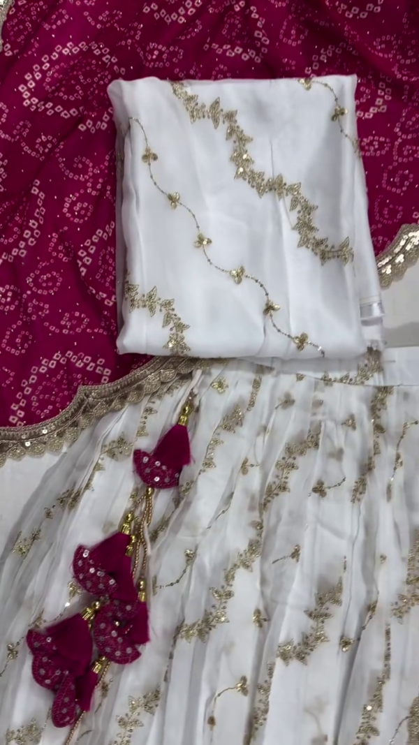 Graceful White and Wine Embroidered Lehenga Set Featuring Sheer Organza Layers with Golden Sequin Work, Contrast Bandhani-Style Dupatta with Gota Border, and Coordinated Blouse – A Striking Festive Ensemble Perfect for Weddings, Navratri, and Traditional Celebrations - Image 2