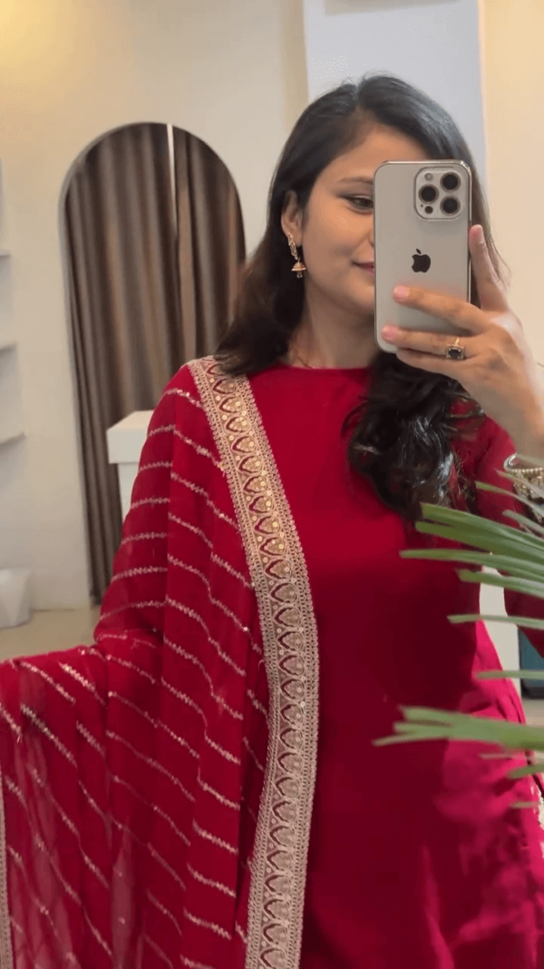 Traditional Red Salwar Kameez Set with Intricate Golden Embroidery, Paired with a Matching Printed Dupatta and Flared Bottoms - Image 2