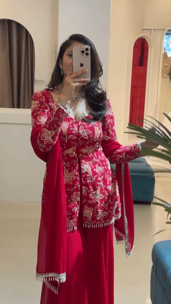Elegant Red Embroidered Anarkali Dress with Floral Detailing, Paired with a Matching Dupatta and Tassel Accents - Image 2