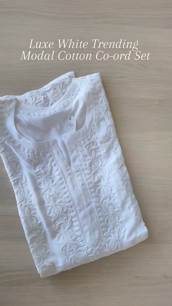 Luxe White Elegance – Trending Modal Cotton Co-ord Set in Pristine White, Featuring Intricate Tone-on-Tone Embroidery and a Soft, Breathable Fabric for a Timeless Summer Staple.
