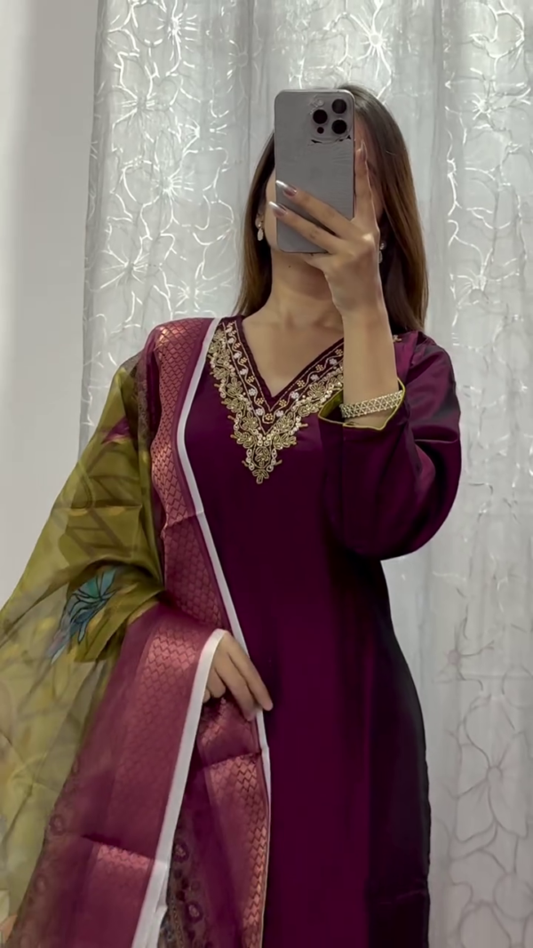 Rich Wine Straight-Cut Suit with Intricate Golden Embroidery on Neckline Paired with Contrasting Lime Green Pants and a Vibrant Floral Organza Dupatta – A Stylish Fusion of Tradition and Bold Color Play for Festive and Semi-Formal Occasions