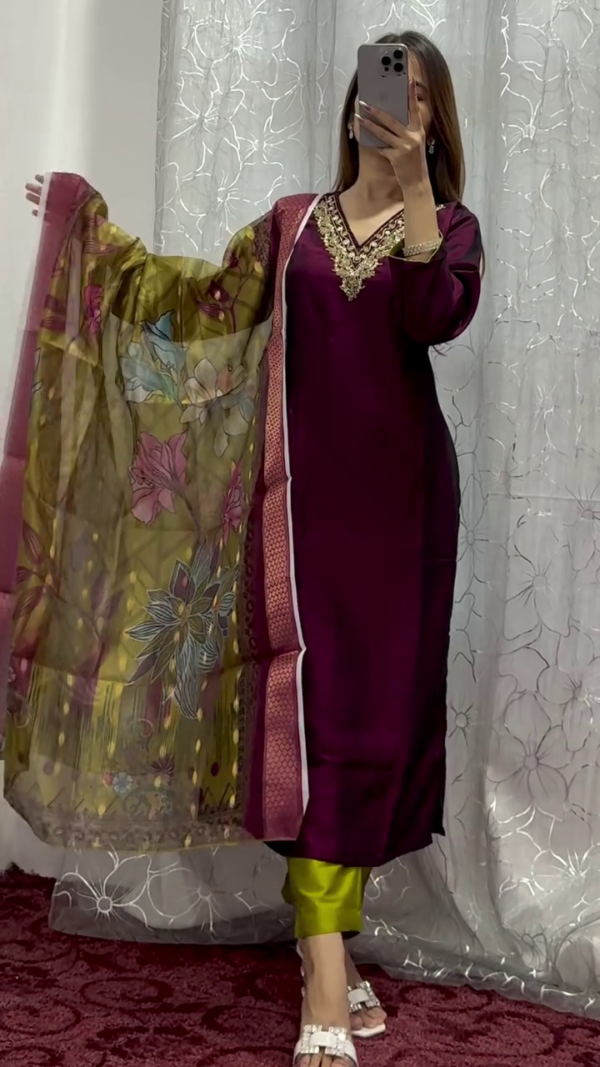 Rich Wine Straight-Cut Suit with Intricate Golden Embroidery on Neckline Paired with Contrasting Lime Green Pants and a Vibrant Floral Organza Dupatta – A Stylish Fusion of Tradition and Bold Color Play for Festive and Semi-Formal Occasions - Image 2