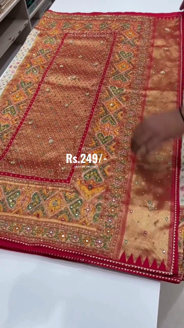 Rust Orange Art Silk Saree with Intricate Multicolor Mirror Work & Traditional Embroidery – Vibrant Border Detailing – Perfect for Festive & Ethnic Celebrations