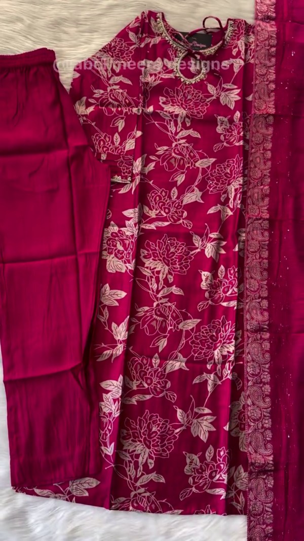 Magenta Pink Floral-Printed Suit Set with Subtle Golden Zari Neckline Embellishment – Paired with a Matching Dupatta Featuring Ornate Threadwork Border and Coordinated Solid Bottoms for a Chic Ethnic Ensemble - Image 2