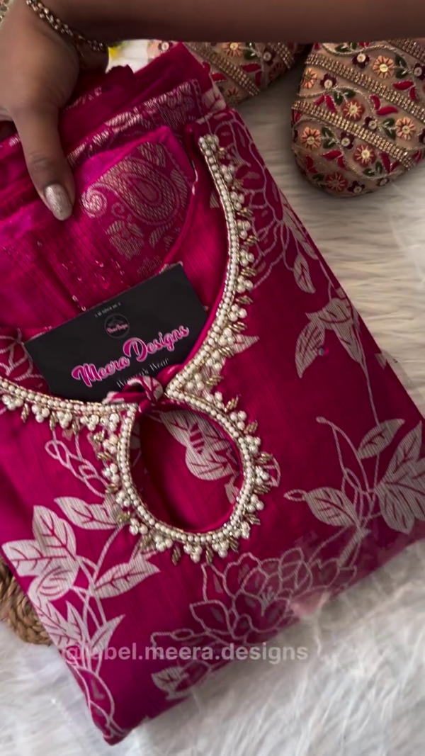 Magenta Pink Floral-Printed Suit Set with Subtle Golden Zari Neckline Embellishment – Paired with a Matching Dupatta Featuring Ornate Threadwork Border and Coordinated Solid Bottoms for a Chic Ethnic Ensemble
